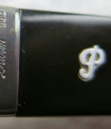 Kupie ustnik Peterson z metalowym logo